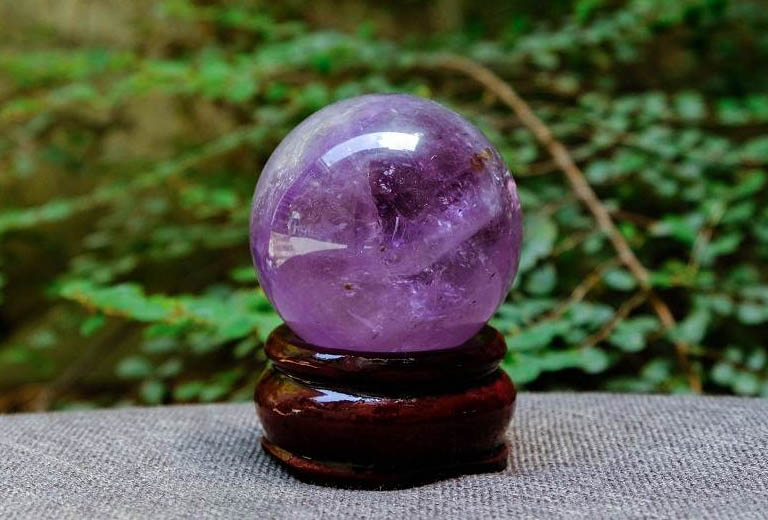 qua cau phong thuy thach anh tim